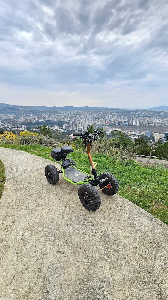 EZRider Electric Scooter with Tbilisi Panoramic View
